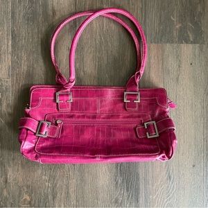 Pink alligator purse